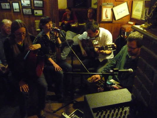 Tim, Brendan and Lucy give a high-powered Celtic set, with excelent singing by Isobel.